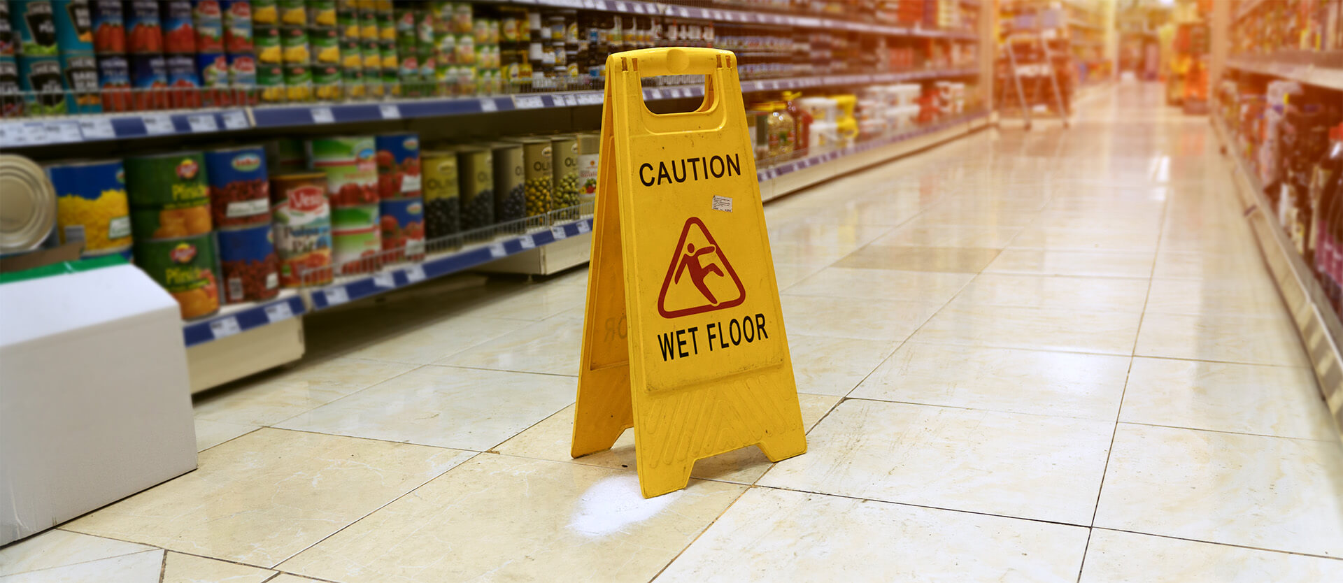 wet floor sign at a grocery store