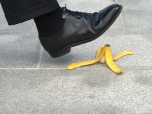 a man about slip and fall on a banana peel